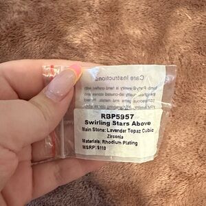 Swirling Stars Above Lavender Topaz Ring